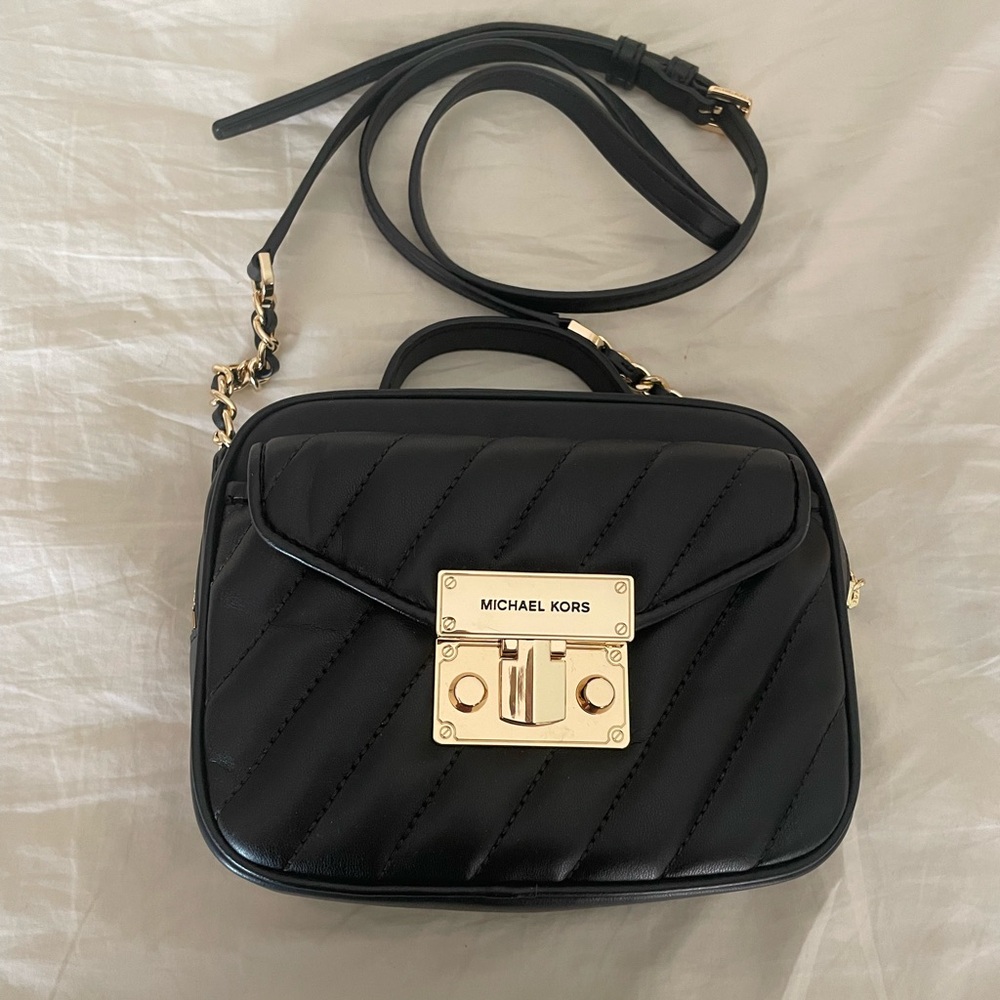 Gorgeous small black Michael Kors bag! Never used.